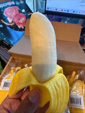 Banana Republic Yellow Squishy Banana Venting Toy